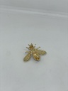 Prendedor dorado con negro de metal de abeja