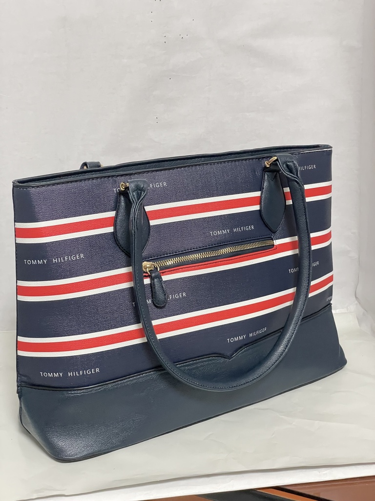 Bolsa azul de cuerina con rayas