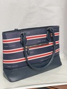 Bolsa azul de cuerina con rayas