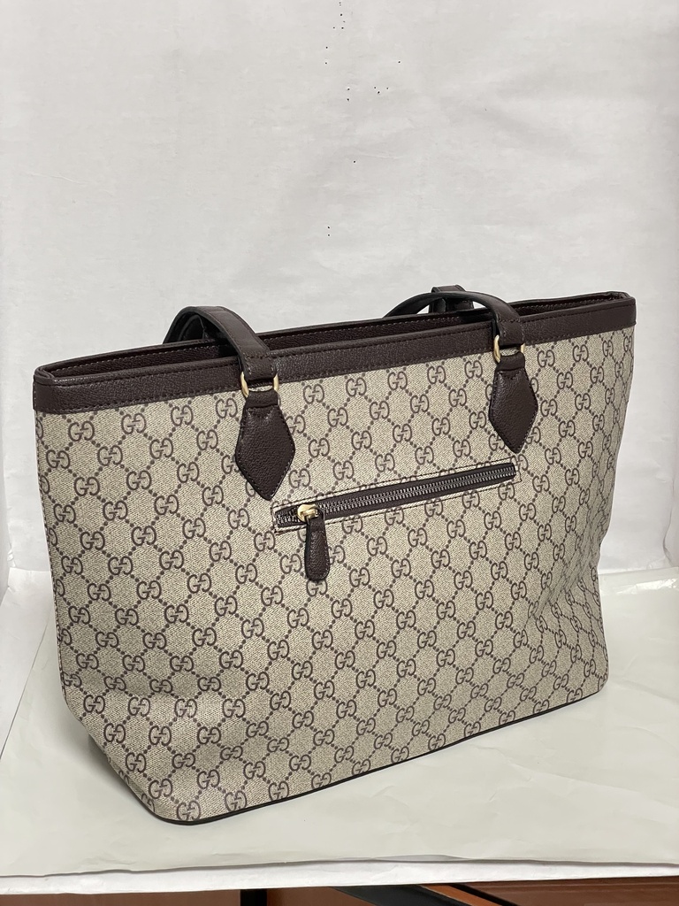 Bolsa de cuerina con franjas