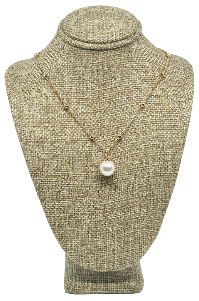 Cadena dorada de rodio con perla blanca