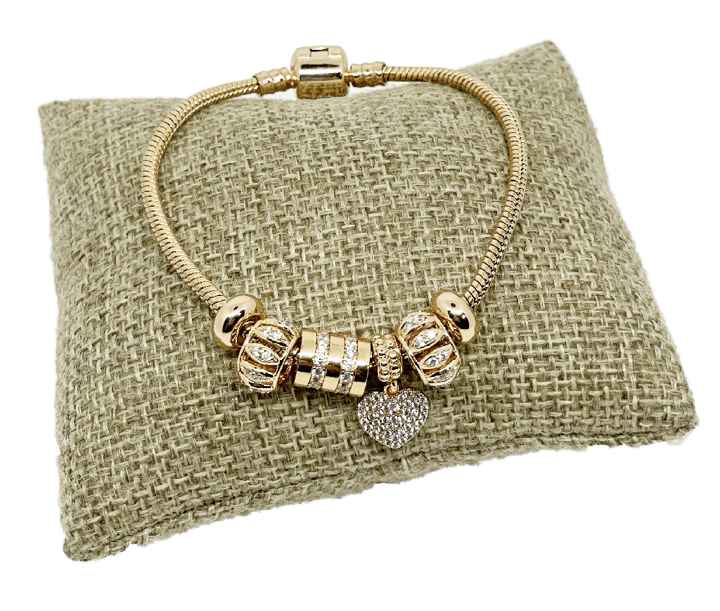 Pulsera dorada de rodio con dijes