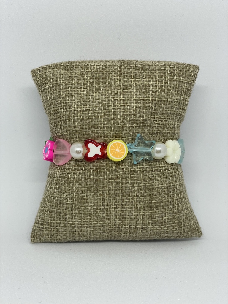 Pulsera de niña con flores y estrellas