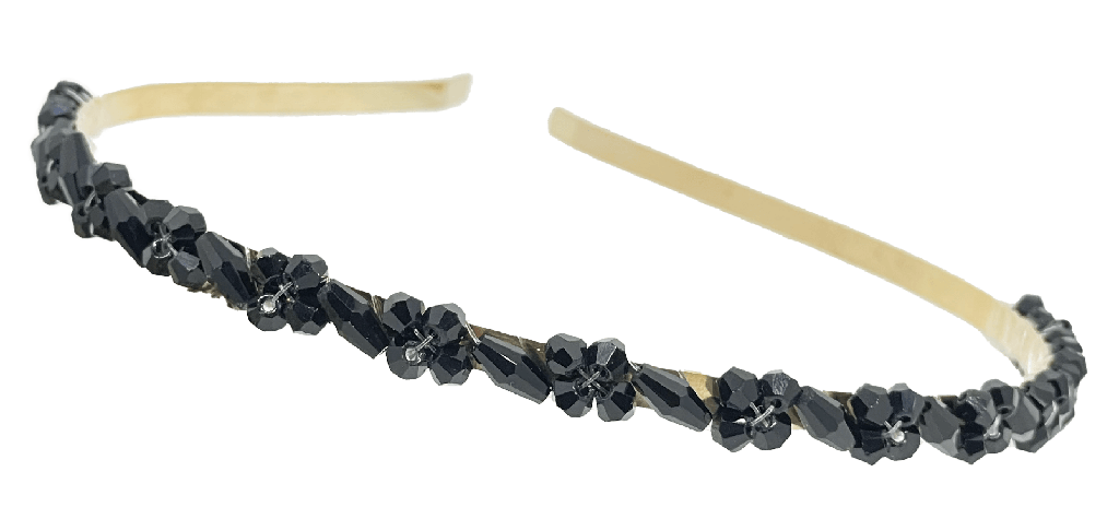 Diadema dorada de metal con piedras