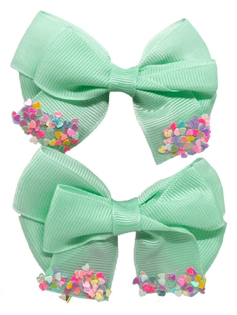 Set- de 2 moñas con corazones