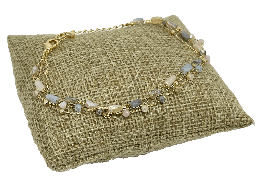 Pulsera de 3 hilos dorado con piedras en rosado y gris
