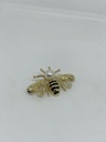 Prendedor dorado con negro de metal de abeja