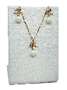 Set de collar y arete dorado de rodio