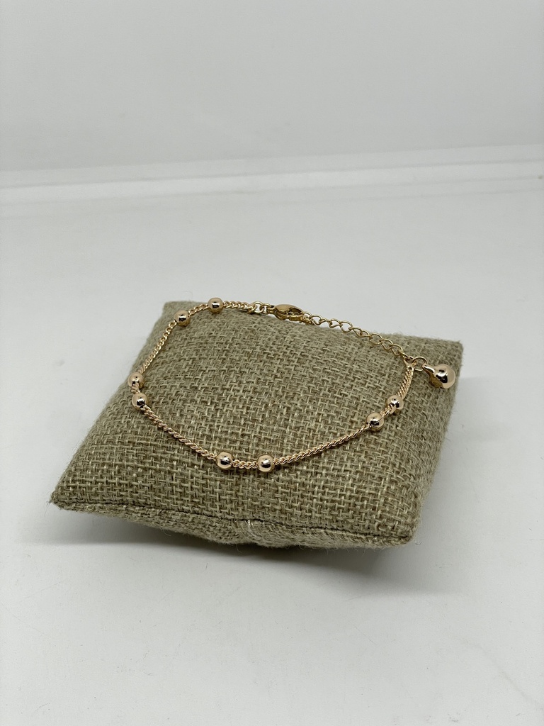 Pulsera dorada de rodio con bolitas