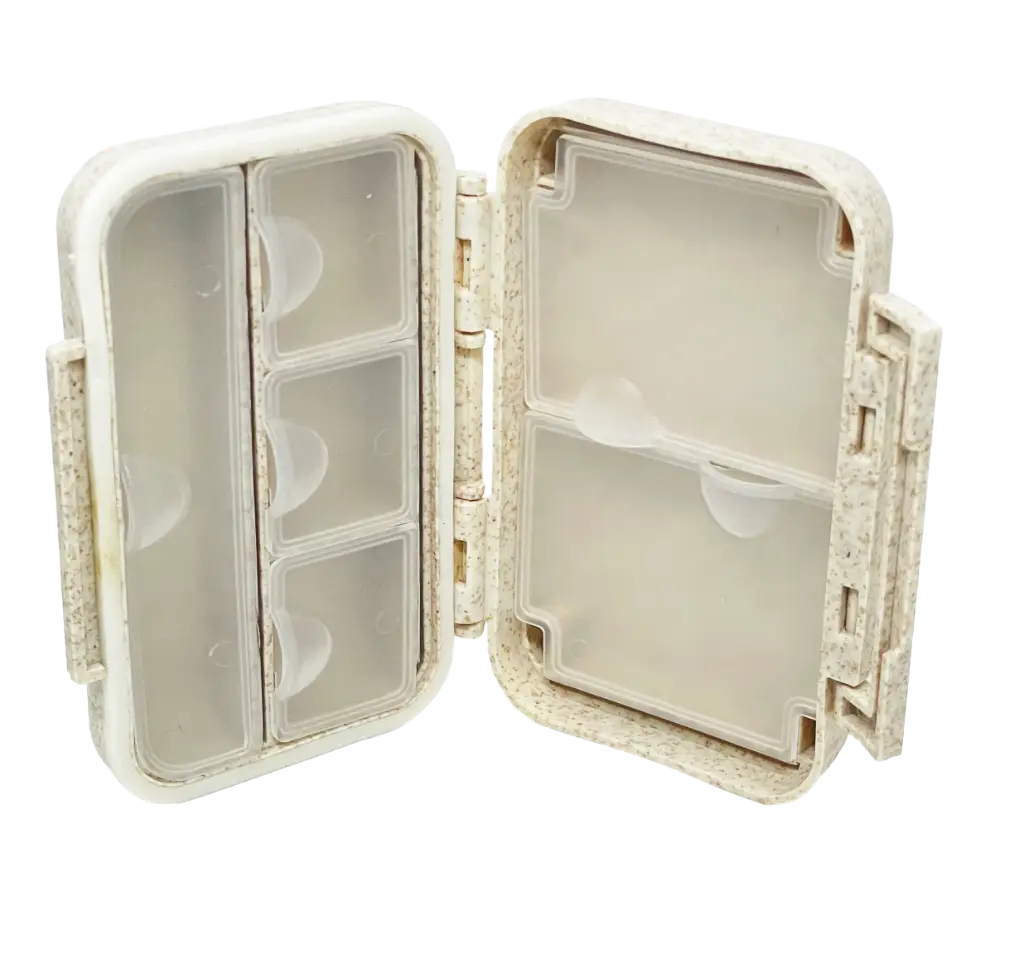 Pastillero beige de plástico