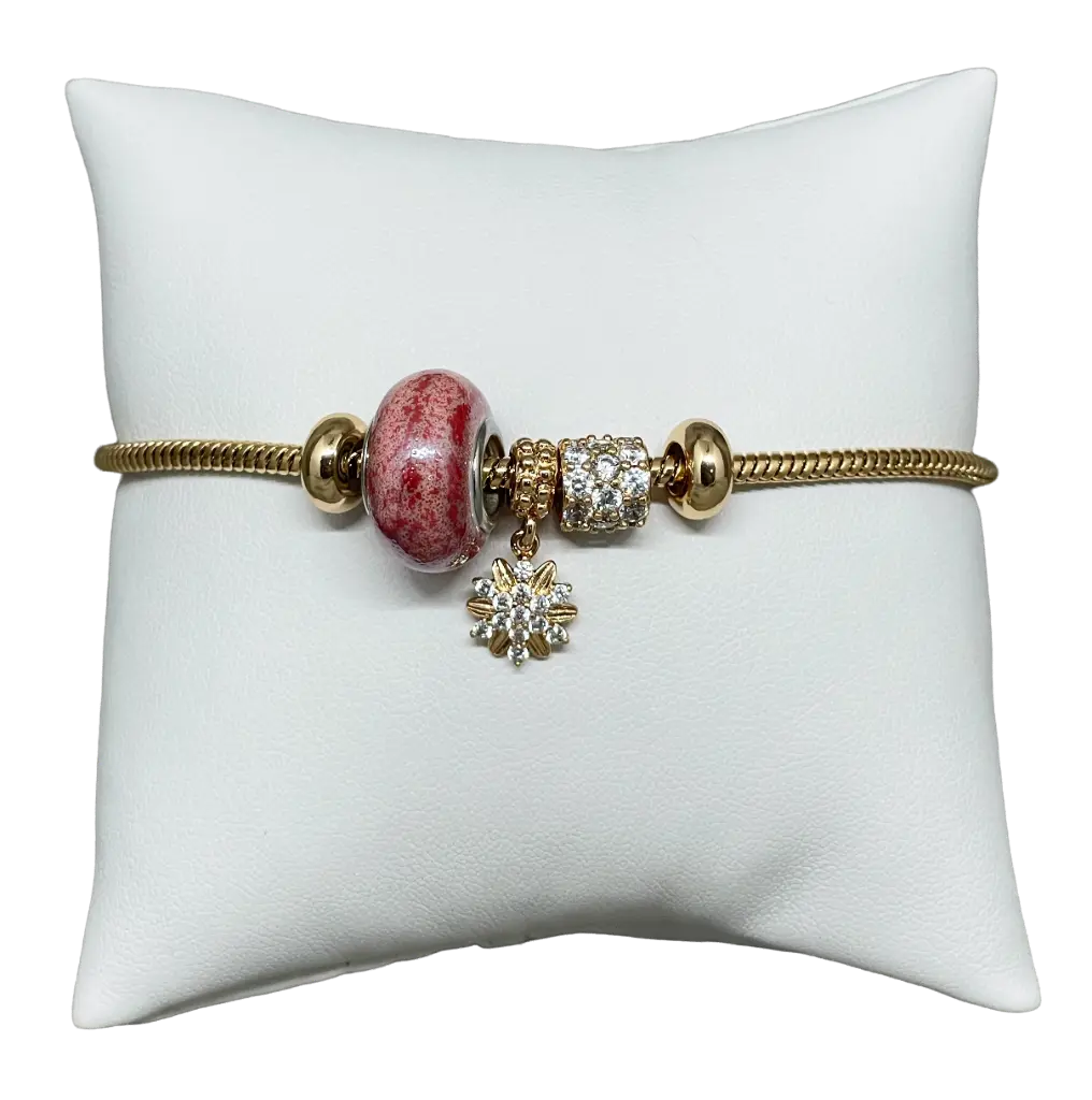 Pulsera dorada de rodio con piedra rosada