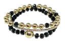 Set de pulseras dorado y negro
