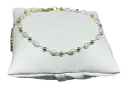Pulsera dorada con perla