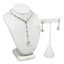 Set de collar y aretes plateados con brillantito