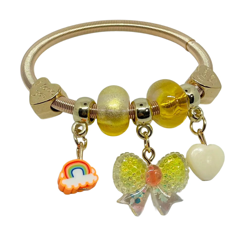Pulsera dorada de niña con dijes de moña
