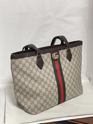 Bolsa de cuerina con franjas