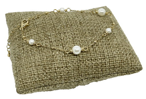 Pulsera con perlas blancas