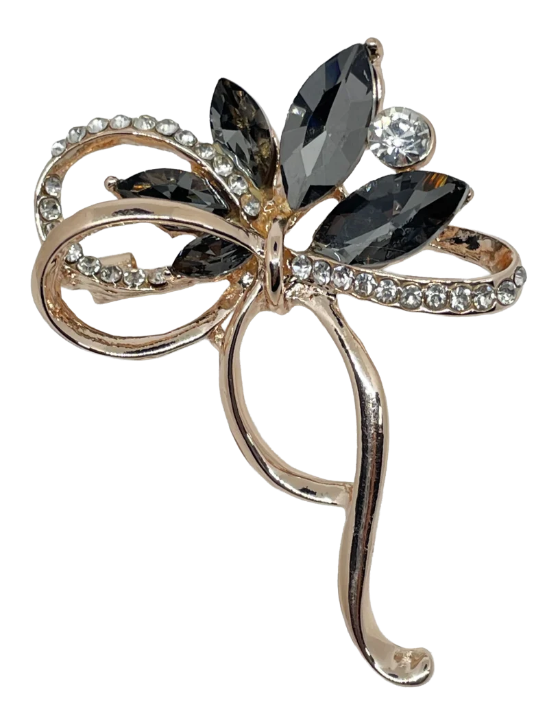 Prendedor dorado con gris de piedras brillantes