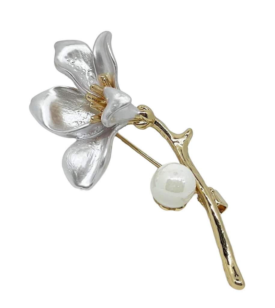 Prendedor dorado de flor