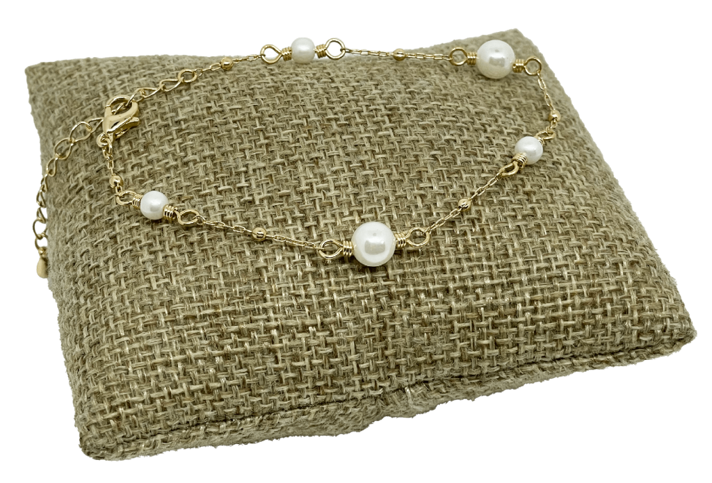 Pulsera con perlas blancas