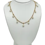 Set de collar y aretes dorados con perlas-gallery-0