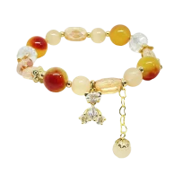 Pulsera elástica de vidrio con dije de oso