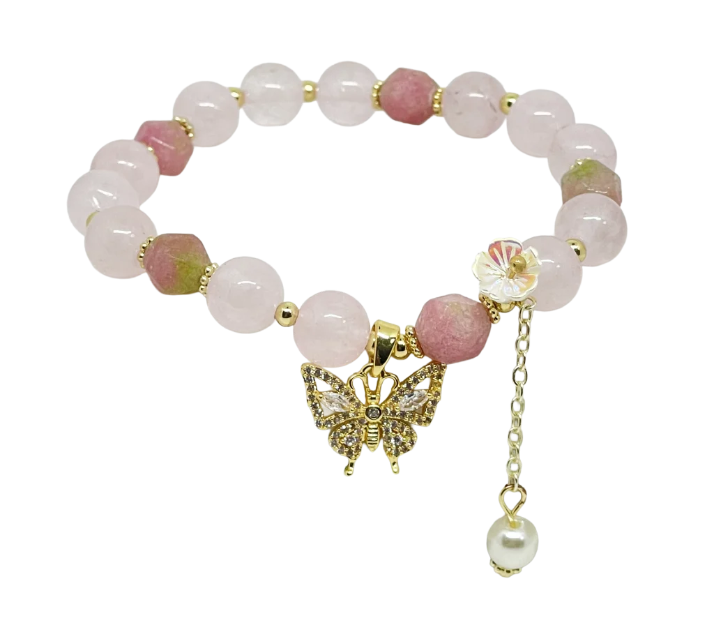 Pulsera rosada de perla con dije de mariposa