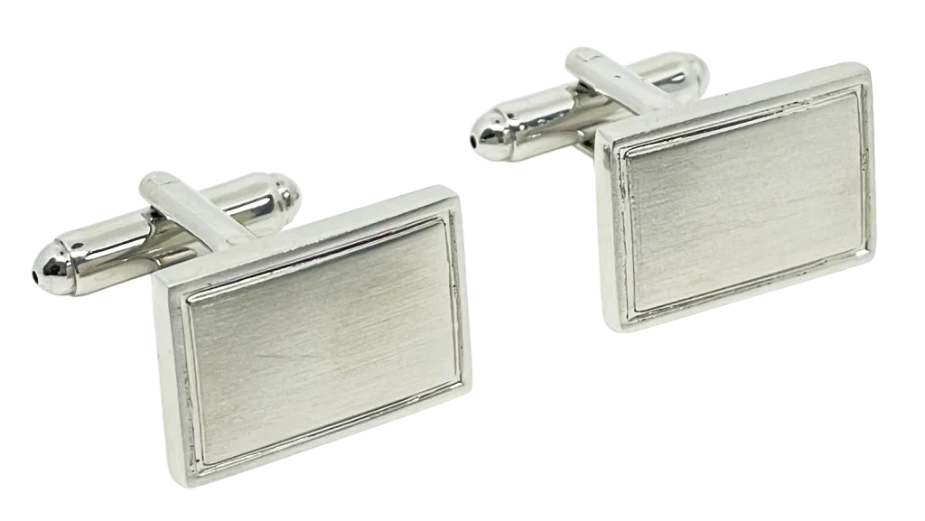 Mancuernillas plateadas de metal